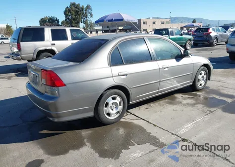 2004 Honda Civic Hybrid z USA, uszkodzony, nr VIN JHMES96674S004295